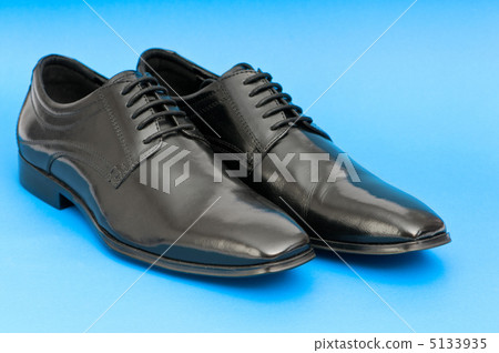 Male shoes isolated on the white background Male shoes isolated on the white background 5133935