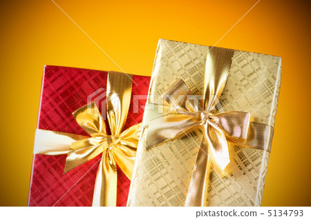 Celebration concept - Gift box against colorful background Celebration concept - Gift box against colorful background 5134793
