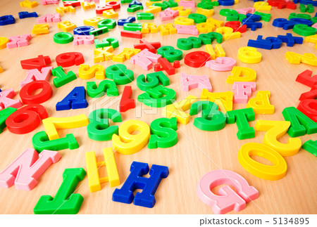 Children letters and digits on the table 5134895