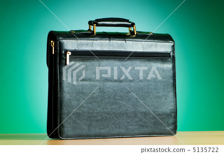 Leather case on the table against background Leather case on the table against background 5135722