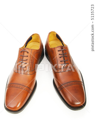Male shoes isolated on the white background Male shoes isolated on the white background 5135723