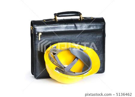 Construction concept - case and hard hat isolated on white Construction concept - case and hard hat isolated on white 5136462