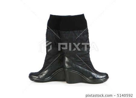 Woman shoes isolated on the white background Woman shoes isolated on the white background 5140592