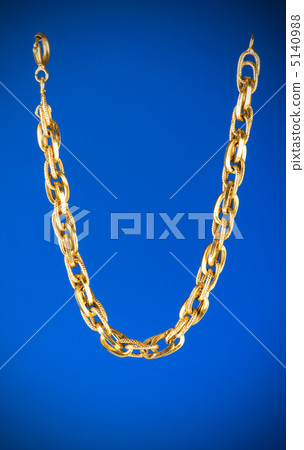 Golden chain isolated on the white background Golden chain isolated on the white background 5140988