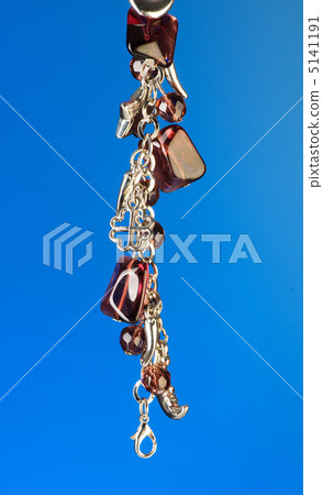Pendant against colour gradient background Pendant against colour gradient background 5141191