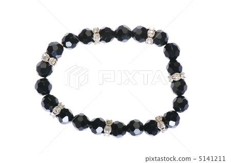 Bracelet isolated on the white background Bracelet isolated on the white background 5141211