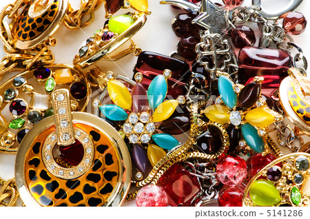 Jewellery arranged at the background Jewellery arranged at the background 5141286