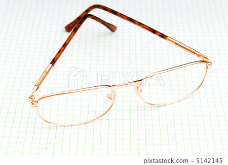 Reading glasses on the black page 5142145