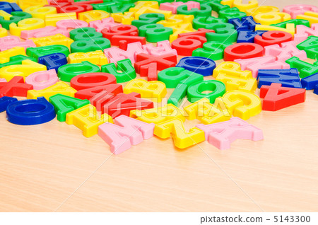 Children letters and digits on the table 5143300