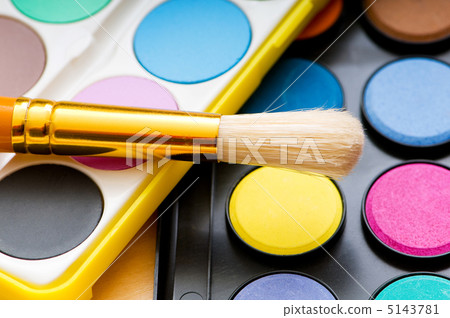 Art concept with painters palette and paint brush 5143781