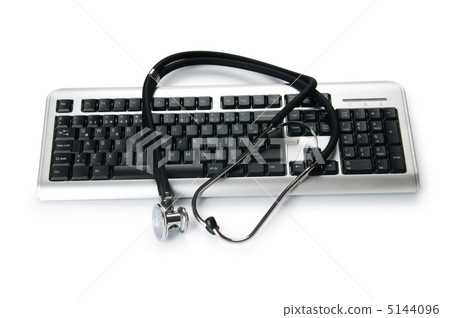 Stethoscope and keyboard illustrating concept of digital securit 5144096