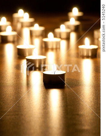 Many burning candles with shallow depth of field 5145240