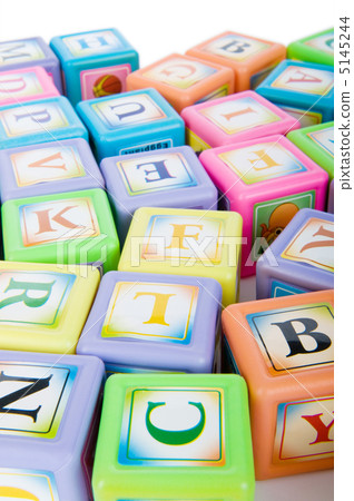 Learning and education concept - pile of alphabet blocks 5145244