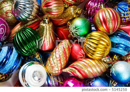 Colourful christmas decoration on a shiny background Colourful christmas decoration on a shiny background 5145250