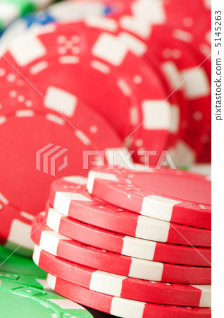 Stack of various casino chips - gambling concept 5145263