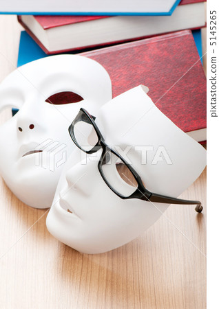 Reading concept with masks, books and  glasses 5145265