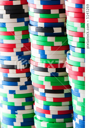 Stack of various casino chips - gambling concept 5145269
