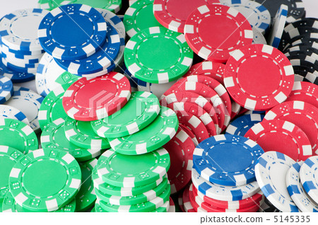 Stack of various casino chips - gambling concept 5145335