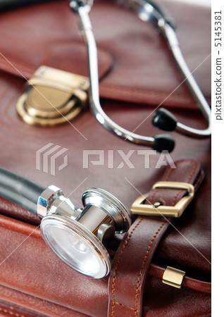 Doctor's brown leather case with the stethoscope 5145381