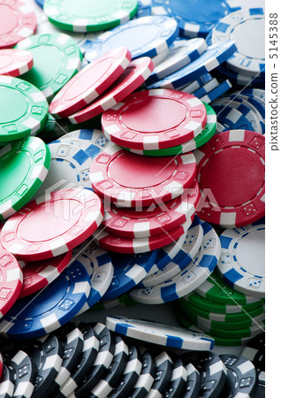 Stack of various casino chips - gambling concept 5145388