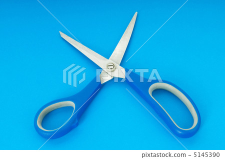Colorful scissors on the color paper background Colorful scissors on the color paper background 5145390