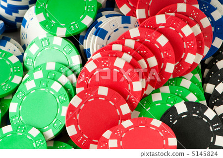 Stack of various casino chips - gambling concept 5145824