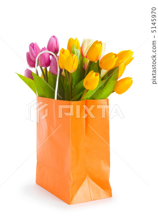 Tulips in shopping bag isolated on white Tulips in shopping bag isolated on white 5145970