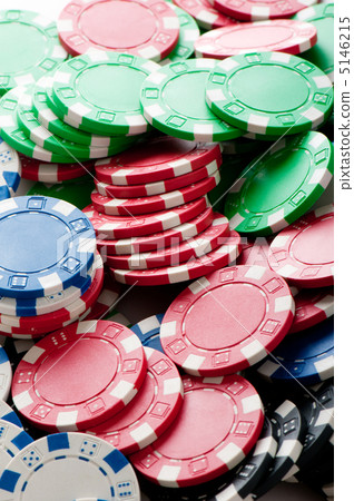 Stack of various casino chips - gambling concept 5146215