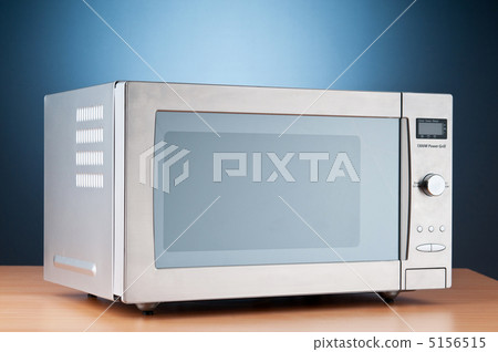 Microwave oven on the table 5156515