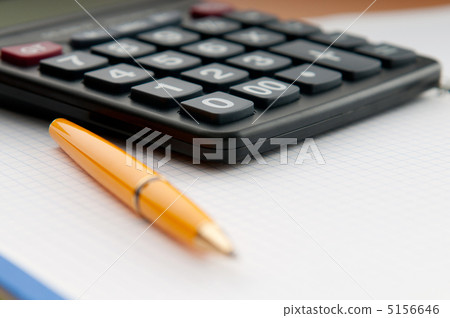 Business concept with notepad and calculator Business concept with notepad and calculator 5156646