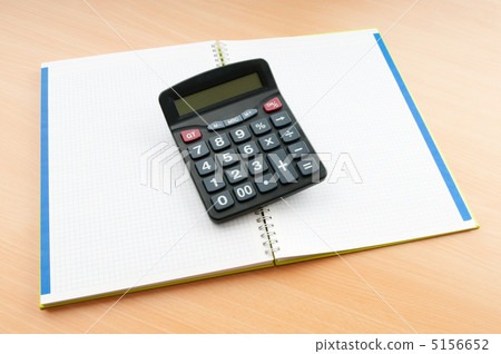 Business concept with notepad and calculator Business concept with notepad and calculator 5156652