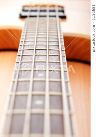 Musical concept with wooden guitar Musical concept with wooden guitar 5156681