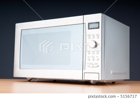 Microwave oven on the table 5156717