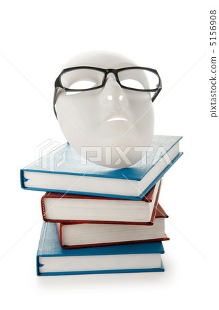 Reading concept with masks, books and glasses Reading concept with masks, books and glasses 5156908