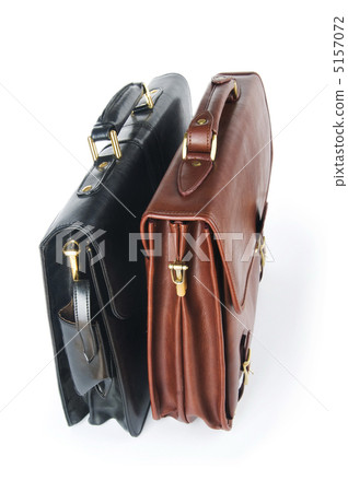 Two leather briefcases isolated on the white Two leather briefcases isolated on the white 5157072