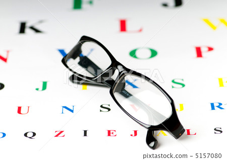Optical reading glasses on the eyesight table 5157080