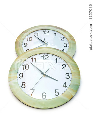 Round clocks isolated on the white background Round clocks isolated on the white background 5157086