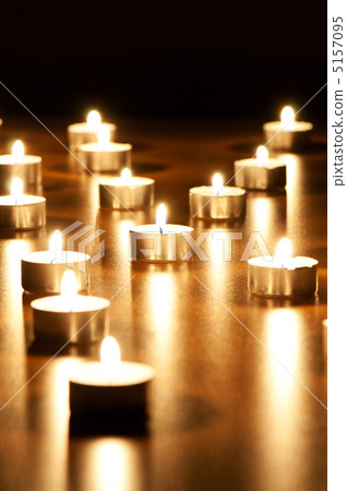 Many burning candles with shallow depth of field Many burning candles with shallow depth of field 5157095