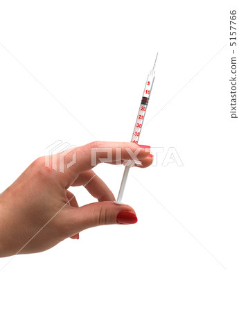Hand holding syringe isolated on the white Hand holding syringe isolated on the white 5157766