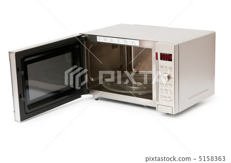 Microwave oven on the table 5158363