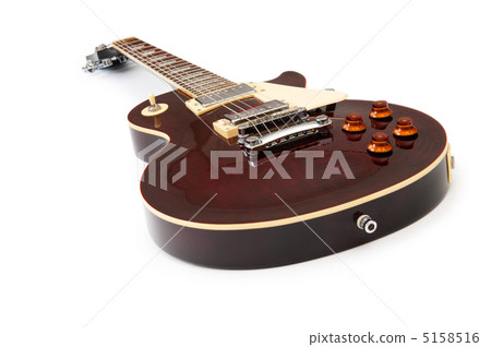 Musical guitar isolated on the white background Musical guitar isolated on the white background 5158516