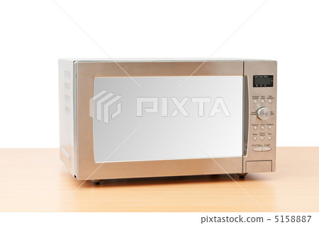 Microwave oven on the table 5158887