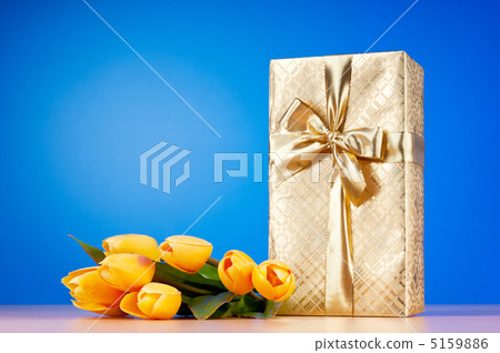 Celebration concept - gift box and tulip flowers Celebration concept - gift box and tulip flowers 5159886
