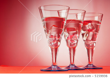Water in the glass against gradient background Water in the glass against gradient background 5159936