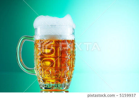 Beer glasses against the colorful gradient background Beer glasses against the colorful gradient background 5159937