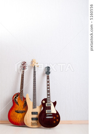 Musical concept with wooden guitar Musical concept with wooden guitar 5160556
