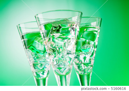 Water in the glass against gradient background 5160616