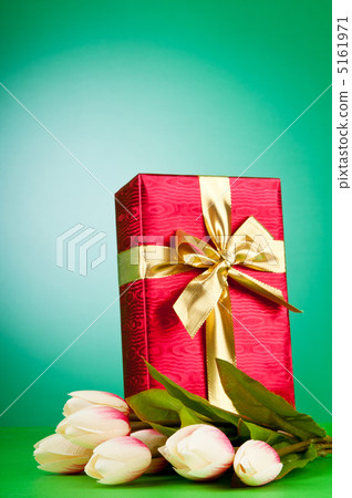 Celebration concept - gift box and tulip flowers 5161971