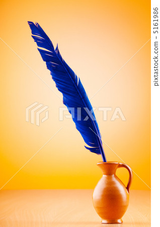 Writing feather against gradient background 5161986