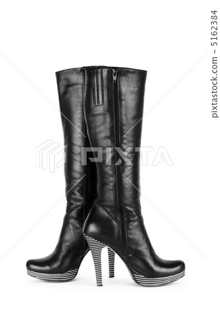Fashion concept with woman top boots Fashion concept with woman top boots 5162384